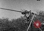 Image of tightrope walking India, 1938, second 32 stock footage video 65675068237