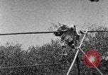 Image of tightrope walking India, 1938, second 33 stock footage video 65675068237