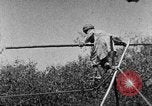 Image of tightrope walking India, 1938, second 37 stock footage video 65675068237