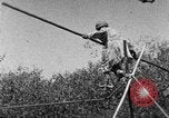 Image of tightrope walking India, 1938, second 39 stock footage video 65675068237