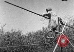 Image of tightrope walking India, 1938, second 42 stock footage video 65675068237