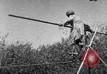 Image of tightrope walking India, 1938, second 43 stock footage video 65675068237
