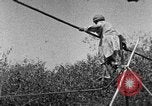 Image of tightrope walking India, 1938, second 46 stock footage video 65675068237