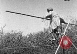 Image of tightrope walking India, 1938, second 47 stock footage video 65675068237
