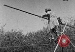 Image of tightrope walking India, 1938, second 56 stock footage video 65675068237