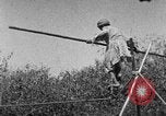 Image of tightrope walking India, 1938, second 57 stock footage video 65675068237