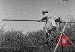 Image of tightrope walking India, 1938, second 58 stock footage video 65675068237