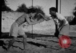 Image of Recruits wrestling at an Indian Army camp India, 1938, second 5 stock footage video 65675068241