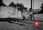 Image of Recruits wrestling at an Indian Army camp India, 1938, second 9 stock footage video 65675068241