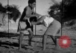 Image of Recruits wrestling at an Indian Army camp India, 1938, second 12 stock footage video 65675068241