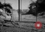 Image of Recruits wrestling at an Indian Army camp India, 1938, second 14 stock footage video 65675068241