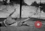 Image of Recruits wrestling at an Indian Army camp India, 1938, second 18 stock footage video 65675068241