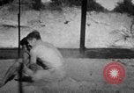 Image of Recruits wrestling at an Indian Army camp India, 1938, second 19 stock footage video 65675068241
