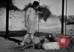 Image of Recruits wrestling at an Indian Army camp India, 1938, second 22 stock footage video 65675068241