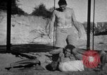 Image of Recruits wrestling at an Indian Army camp India, 1938, second 23 stock footage video 65675068241