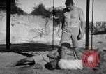 Image of Recruits wrestling at an Indian Army camp India, 1938, second 24 stock footage video 65675068241