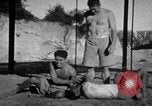 Image of Recruits wrestling at an Indian Army camp India, 1938, second 25 stock footage video 65675068241