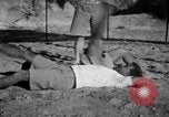 Image of Recruits wrestling at an Indian Army camp India, 1938, second 26 stock footage video 65675068241
