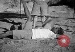 Image of Recruits wrestling at an Indian Army camp India, 1938, second 30 stock footage video 65675068241