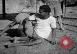 Image of Recruits wrestling at an Indian Army camp India, 1938, second 33 stock footage video 65675068241