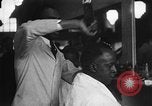 Image of barber Harlem New York City USA, 1930, second 10 stock footage video 65675068244