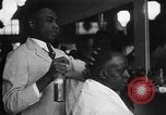 Image of barber Harlem New York City USA, 1930, second 12 stock footage video 65675068244