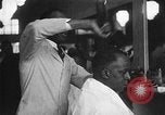 Image of barber Harlem New York City USA, 1930, second 13 stock footage video 65675068244