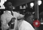 Image of barber Harlem New York City USA, 1930, second 14 stock footage video 65675068244