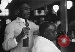 Image of barber Harlem New York City USA, 1930, second 15 stock footage video 65675068244