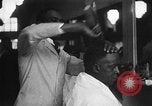 Image of barber Harlem New York City USA, 1930, second 16 stock footage video 65675068244