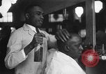 Image of barber Harlem New York City USA, 1930, second 17 stock footage video 65675068244