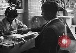 Image of barber Harlem New York City USA, 1930, second 28 stock footage video 65675068244