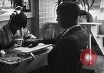 Image of barber Harlem New York City USA, 1930, second 32 stock footage video 65675068244
