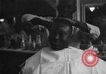 Image of barber Harlem New York City USA, 1930, second 33 stock footage video 65675068244