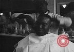 Image of barber Harlem New York City USA, 1930, second 34 stock footage video 65675068244