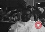 Image of barber Harlem New York City USA, 1930, second 35 stock footage video 65675068244