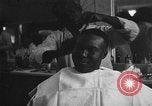 Image of barber Harlem New York City USA, 1930, second 36 stock footage video 65675068244