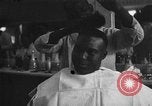 Image of barber Harlem New York City USA, 1930, second 37 stock footage video 65675068244