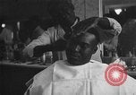 Image of barber Harlem New York City USA, 1930, second 38 stock footage video 65675068244