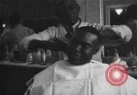Image of barber Harlem New York City USA, 1930, second 39 stock footage video 65675068244