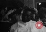 Image of barber Harlem New York City USA, 1930, second 40 stock footage video 65675068244