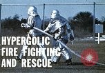 Immagine di Fire Fighting drill United States USA, 1971, secondo 9 filmato di repertorio 65675068264