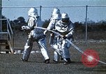 Immagine di Fire Fighting drill United States USA, 1971, secondo 11 filmato di repertorio 65675068264