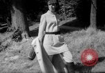 Image of models pose Paris France, 1967, second 44 stock footage video 65675068303