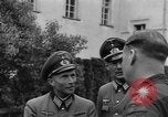 Standbild Kaplan Deggendorf Deutschland, 1945, aus Sekunde 52 historischem Filmmaterial Videoclip 65675068331
