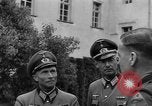 Standbild Kaplan Deggendorf Deutschland, 1945, aus Sekunde 55 historischem Filmmaterial Videoclip 65675068331