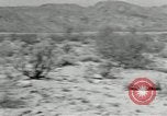 Image of folding a camouflage flat net United States USA, 1942, second 1 stock footage video 65675068405