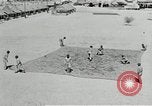 Image of folding a camouflage flat net United States USA, 1942, second 5 stock footage video 65675068405