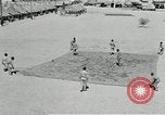 Image of folding a camouflage flat net United States USA, 1942, second 8 stock footage video 65675068405