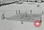 Image of folding a camouflage flat net United States USA, 1942, second 9 stock footage video 65675068405